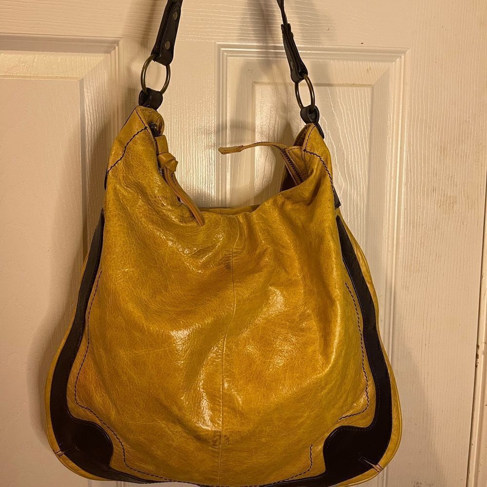 Kate Landry leather mustard yellow slouch shoulder bag with brow trim.